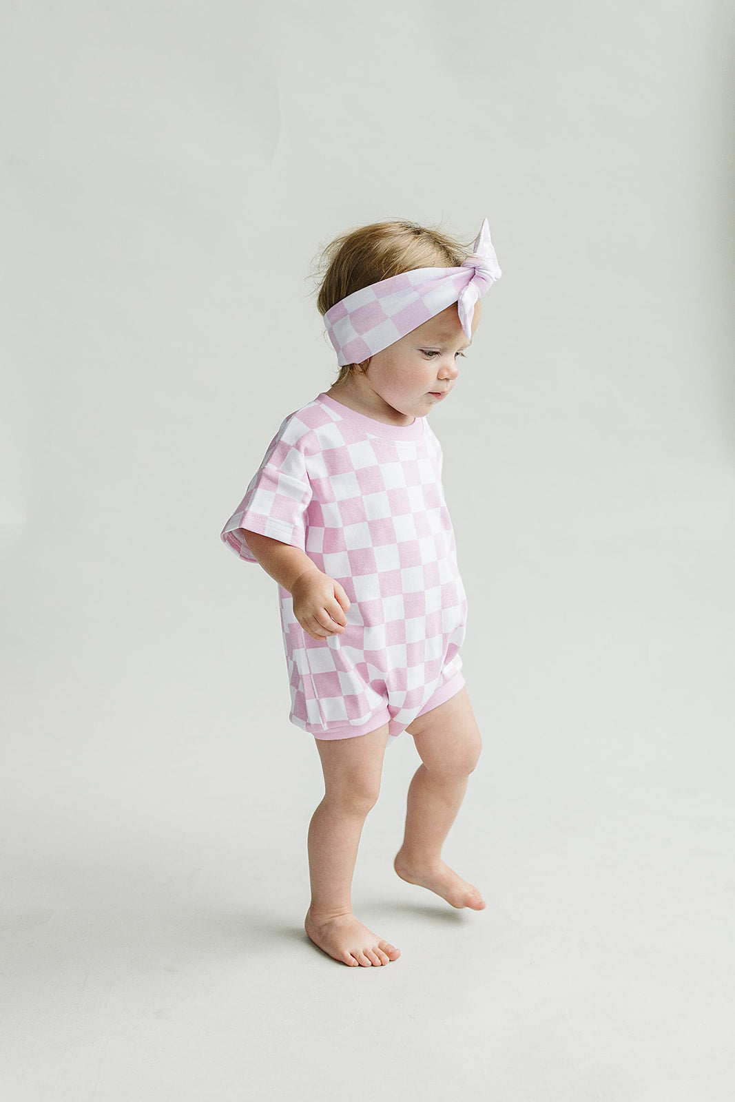 Short Sleeve Bubble Romper | Checkered Smiley Pink