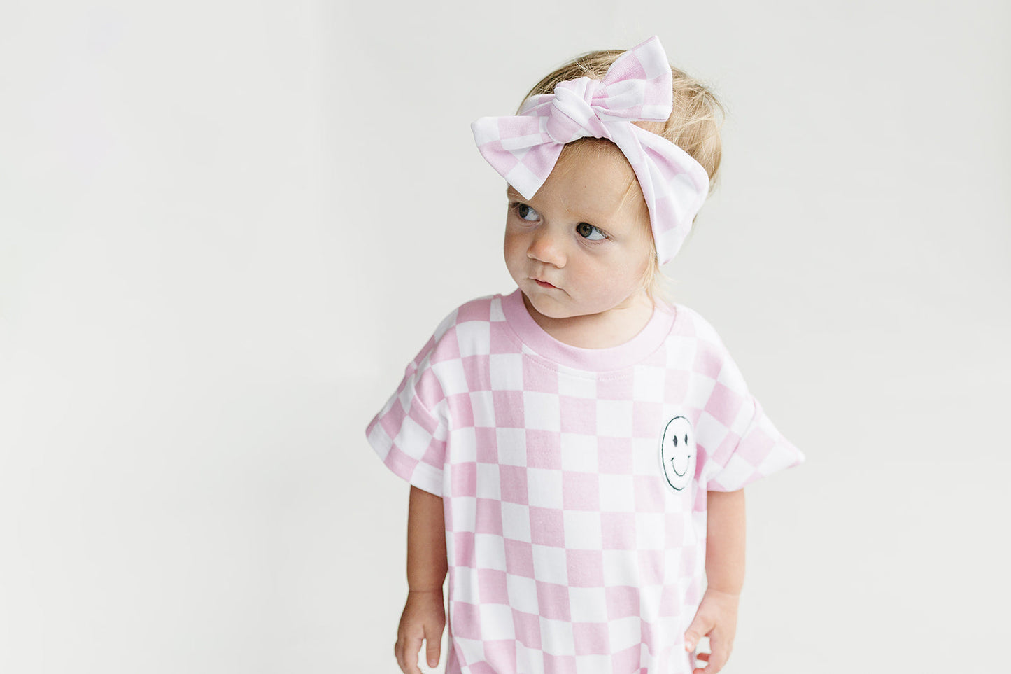 Short Sleeve Bubble Romper | Checkered Smiley Pink